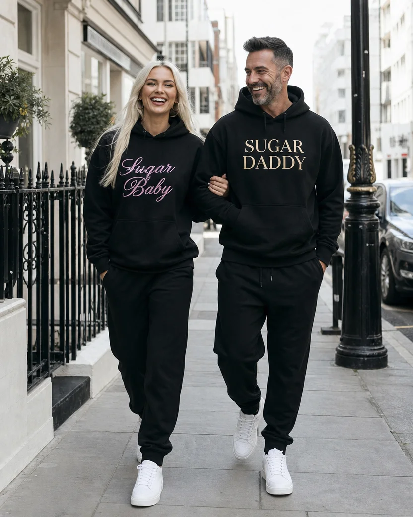 Sugar Baby and Sugar Daddy hoodies worn together on a city street